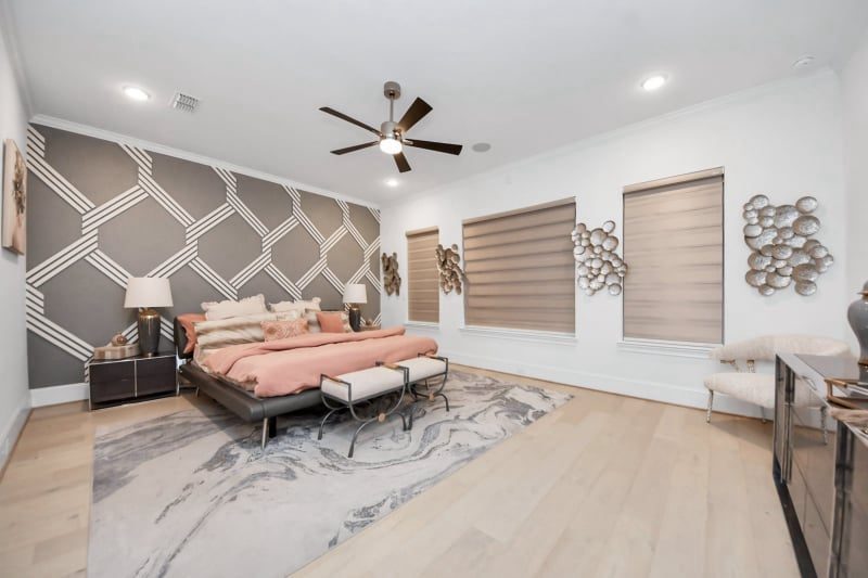 Staged bedroom in Cypress, TX by Halo Staging & Design