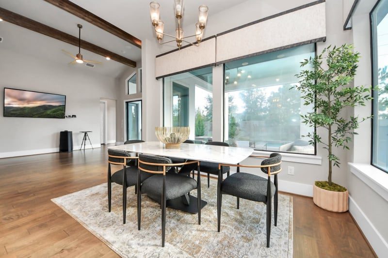 Staged dining room in Fulshear, TX by Halo Staging & Design